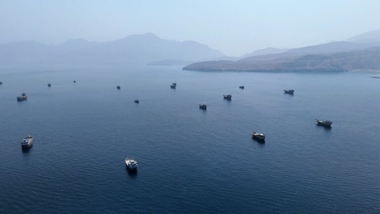 A drone view shows vessels near the Strait of Hormuz, as seen from Musandam, Oman, August 28, 2026.
