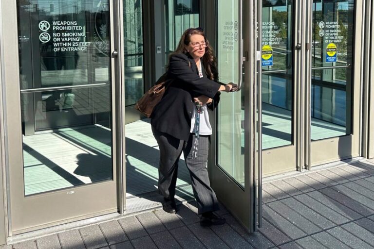 Heather Honey, a conservative election researcher, leaves the federal courthouse in Harrisburg, Pennsylvania, on October 18, 2024