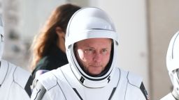 NASA astronaut Mike Fincke walks out of the Neil A. Armstrong Operations and Checkout Building alongside other Crew-11 mission astronauts, before heading to pad 39A for launch to the International Space Station at the Kennedy Space Center in Cape Canaveral, Florida, on August 1, 2025.