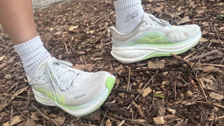 Hoka Clifton Pro Shoes on mulch.