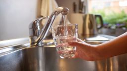 Pouring Fresh Tap Water Into a Glass