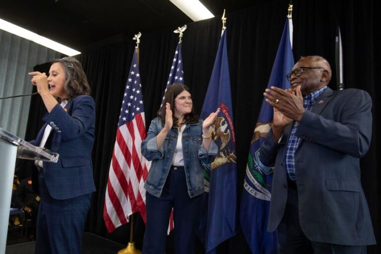 Rep. Haley Stevens, center, hosts a campaign event with former House Majority Whip Congressman Jim Clyburn, right, and Michigan Gov. Gretchen Whitmer, left, in Detroit, Michigan, on July 24, 2026.