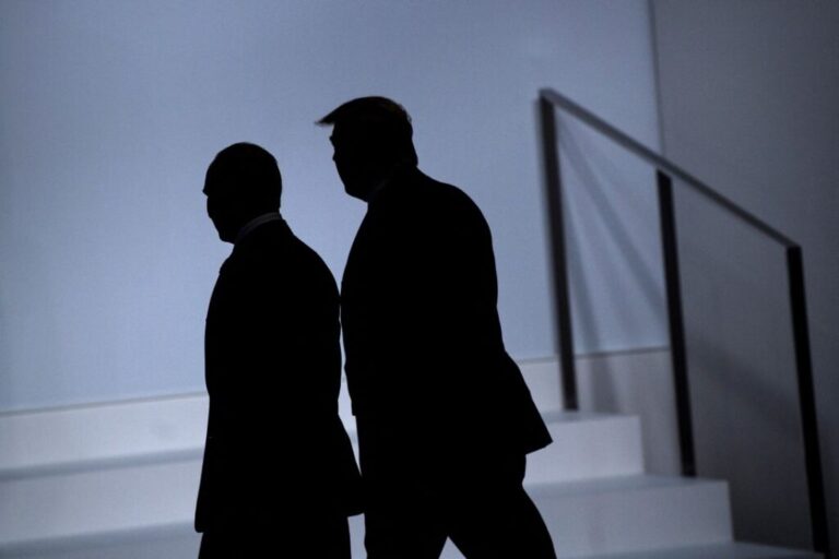 Russia's President Vladimir Putin and President Donald Trump arrive for a group photo at the G20 Summit in Osaka on June 28, 2019.