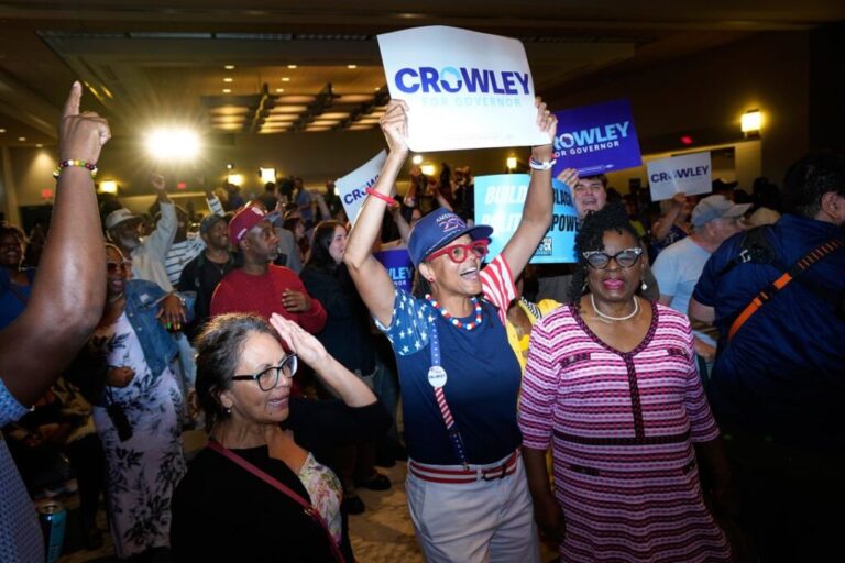 Supporters of Crowley react to election results coming in, during a primary election night watch party in Milwaukee, on Tuesday.