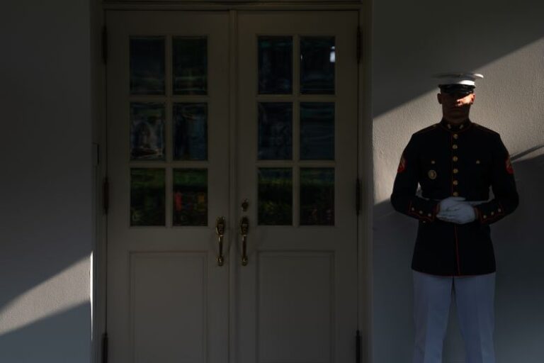 A US Marine stands outside the West Wing of the White House in Washington, DC, on July 20, 2026.