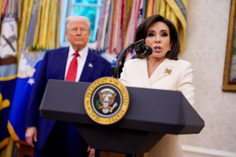 US President Donald Trump looks as Jeanine Pirro speaks during her swearing in ceremony in the Oval Office of the White House on May 28, 2025 in Washington, DC.