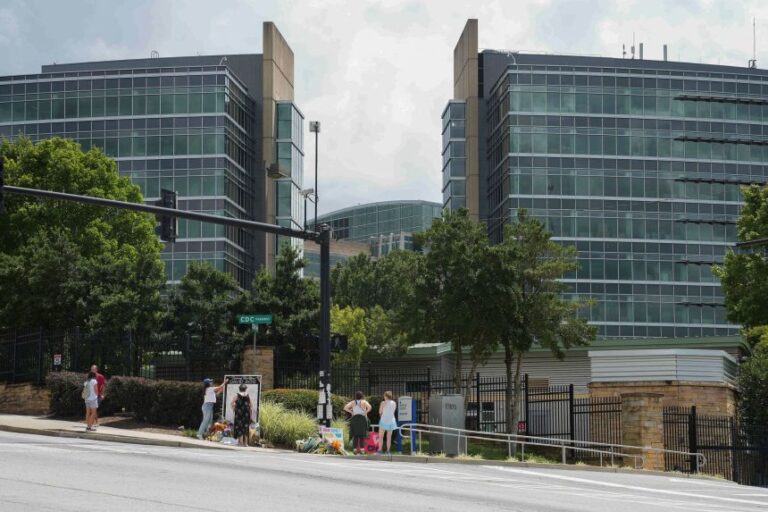 Community members come out to pay their respects for David Rose, an officer killed on August 8th, in Atlanta, Georgia, while stopping a gunman who was shooting at the Center of Disease Control and Prevention in Atlanta, Georgia, on August 11, 2025.