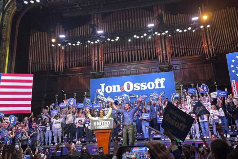 Sen. Jon Ossoff and gubernatorial nominee Keisha Lance Bottom share the stage at a joint campaign rally in Atlanta on May 30.