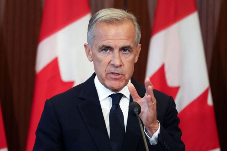 Canadian Prime Minister Mark Carney speaks at a new conference in Ottawa, Ontario, on August 22, after trade talks with the US collapsed.