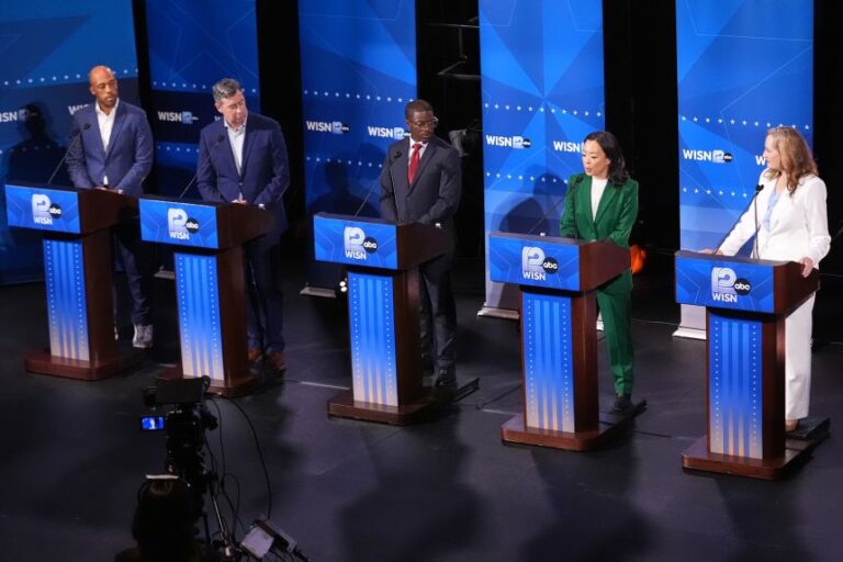 From left: Democratic gubernatorial candidates Mandela Barnes, Joel Brennan, David Crowley, Francesca Hong and Kelda Roys attend a primary debate in Milwaukee, on July 28.