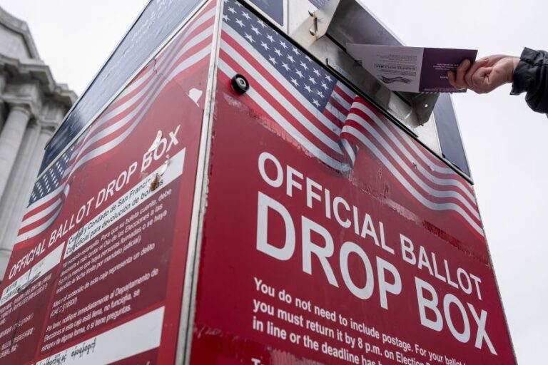 A voter drops their ballot at an official ballot drop box outside City Hall during a primary election in San Francisco, California, US, on Tuesday, June 2, 2026.
