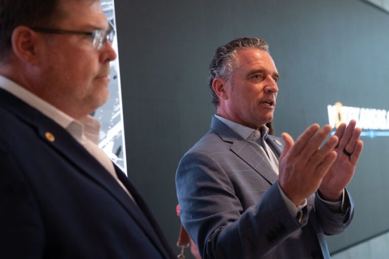 Kansas state Senate President Ty Masterson talks alongside his gubernatorial running mate, state Sen. Jeff Klemp, at the Docking State Office Building, in Topeka, Kansas, on June 1.