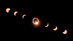TOPSHOT - In this composite of 7 photographs, the moon passes by the sun into totality creating the diamond ring effect during a total solar eclipse in Bloomington, Indiana, on April 8, 2024. This year's path of totality is 115 miles (185 kilometers) wide and home to nearly 32 million Americans, with an additional 150 million living less than 200 miles from the strip. The next total solar eclipse that can be seen from a large part of North America won't come around until 2044. (Photo by JOSH EDELSON / AFP) (Photo by JOSH EDELSON/AFP via Getty Images)
