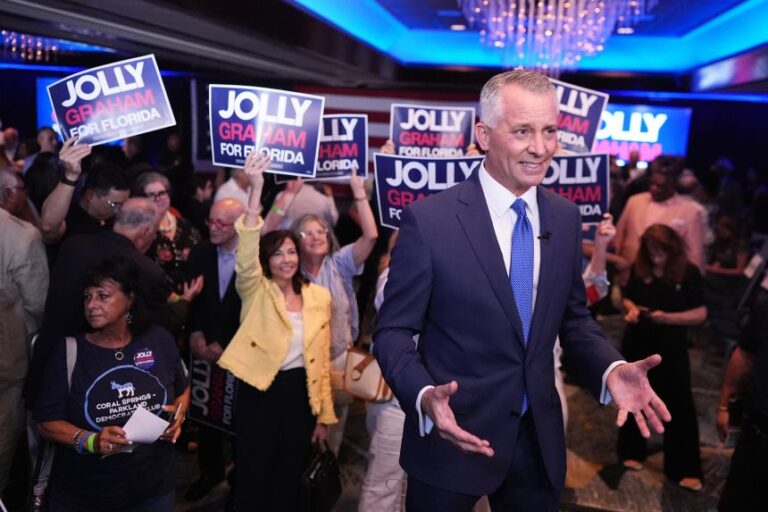 Florida Democratic gubernatorial candidate David Jolly speaks in front of supporters during a primary election night watch party in Miami Lakes, Florida, on Tuesday.