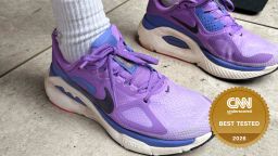 Nike shoes on a cement path.