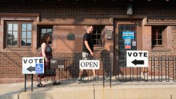 Voters arrive at Charles Allis Art Museum to cast their ballots on primary Election Day in Milwaukee, on August 11, 2026. (