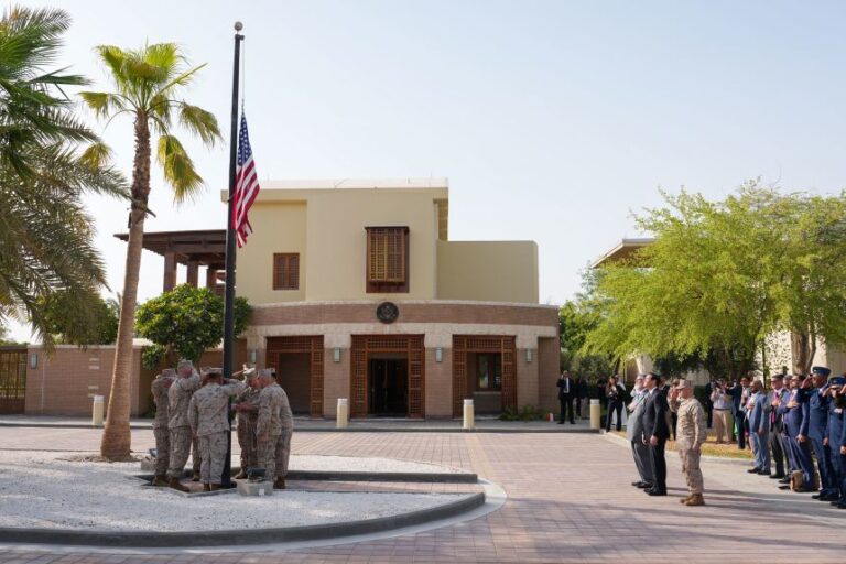 US Secretary of State Marco Rubio and Steven Butler, charge d'affaires ad interim of the US embassy in Kuwait, attend a flag raising ceremony at the embassy amid Rubio's visit to the Middle East to discuss the interim deal between the US and Iran with Arab Gulf allies, in Kuwait City, Kuwait, Wednesday, June 24.
