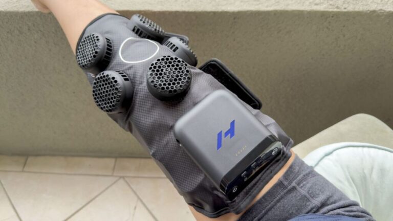 Person wearing Hyperice X 2 Knee.