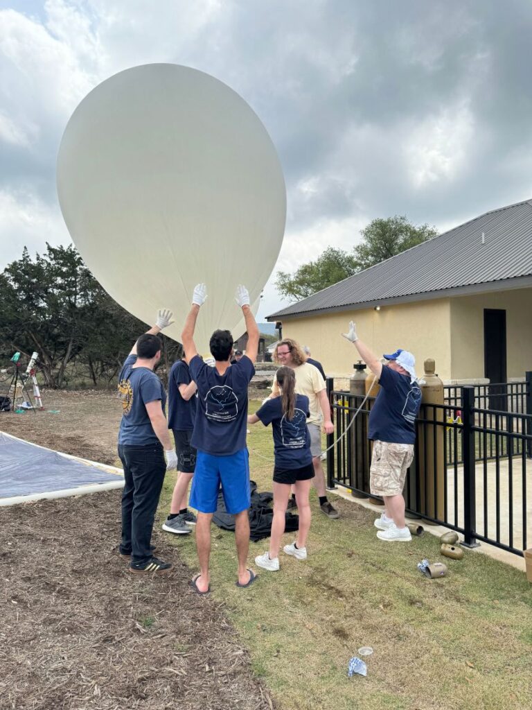 The University of Pittsburgh research team prepares a high-altitude balloon.