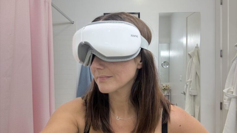 Person wearing the Renpho Eyeris 1 Smart Eye Massager and Heat Mask.