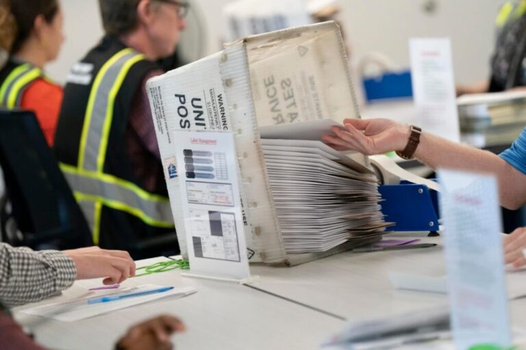 Mail-in ballots are prepared at the Wake County Board of Elections in Raleigh, North Carolina, on September 11.