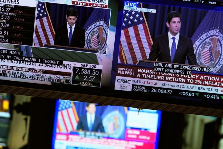 Screens display a news conference held by Federal Reserve chairman Kevin Warsh on the floor of the New York Stock Exchange in New York, on Wednesday, September 16.