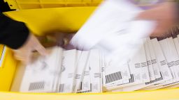 Election workers sort ballots at Contra Costa County's election operations facility in Martinez, California, on May 27, 2026.