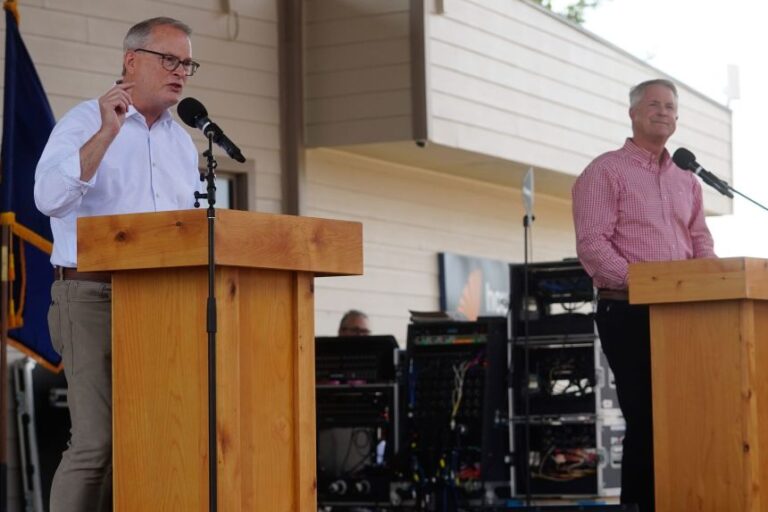 Adam Hamilton, left, answers questions alongside US Sen. Roger Marshall during the US Senate debate at the Kansas State Fair in Hutchinson on September 12, 2026.