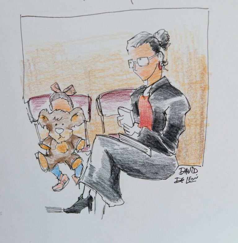 A woman sits next to a child who’s appearing for her immigration hearing.