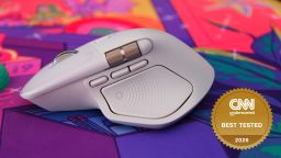 The white Logitech MX Master 4 mouse is on a colorful mousepad, and a badge in the corner reads CNN Underscored best tested 2026