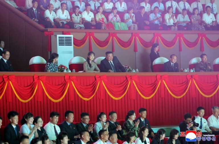 North Korean leader Kim Jong Un, accompanied by his daughter Kim Ju Ae and his wife Ri Sol Ju, watches a performance by the National Acrobatic Troupe's circus marking National Liberation Day, in Pyongyang, North Korea, August 16.