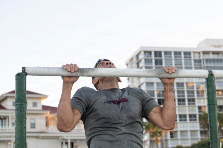 Secretary of Defense Pete Hegseth participates in morning physical training with US service members in Coronado Beach, California, on October 18, 2025.