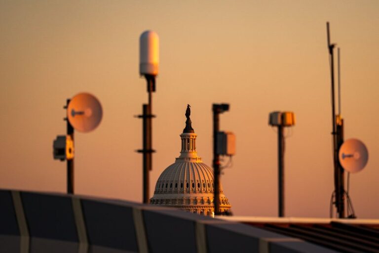 The US Capitol is seen past antennas and satellites atop the FBI Washington Field Office, on February 10.
