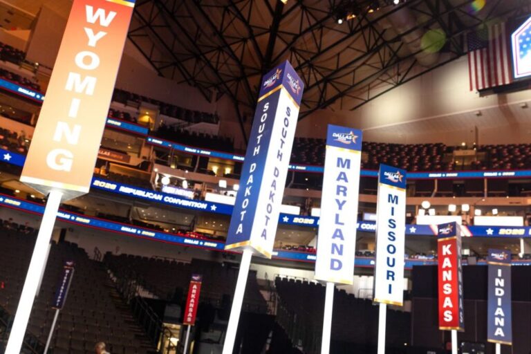 Signage for different state delegates is seen ahead of the GOP Midterm Convention, at American Airlines Center in Dallas, Texas, on Tuesday.