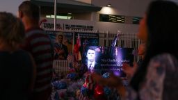 A sea of balloons, flowers and flags stretches across a makeshift memorial during a vigil for right-wing activist and Turning Point USA founder Charlie Kirk, outside the organization's headquarters in Phoenix, Arizona on September 19, 2025.