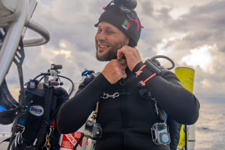 Sorensen prepares to dive. He'll typically conduct two or three dives a day, alternating with his dive partner.