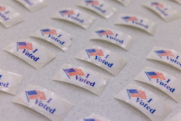 Stickers are placed out for voters at Greater Mount Moriah Primitive Baptist Church on March 3 in Charlotte, North Carolina.