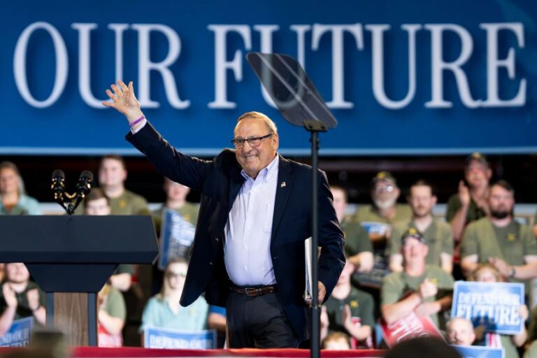 Former Maine Gov. Paul LePage, a candidate for Maine's second congressional House district, greets supporters before Vice President JD Vance spoke during a visit to Compotech, a composite technology company in August in Brewer, Maine.