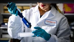 An assistant conducts cancer vaccine research in the lab at the Moderna Inc. headquarters in Cambridge, Massachusetts, US, on Tuesday, March 26, 2024. The forthcoming RSV shot, expected to get US regulatory approval this month, is Moderna's first chance to show the versatility of mRNA technology to more effectively treat and prevent a range of illnesses from the flu to cancer. It will be the first mRNA product for something other than Covid. Photographer: Adam Glanzman/Bloomberg via Getty Images