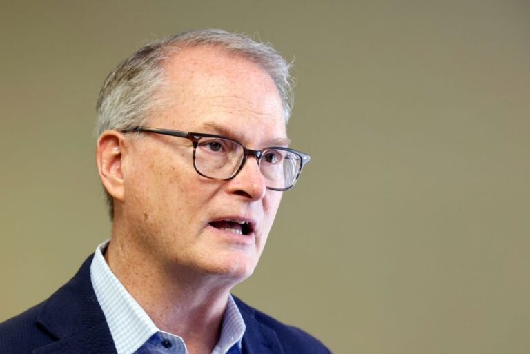 Democratic US Senate candidate Adam Hamilton of Kansas speaks at the Health Partnership Clinic for low-income families on Aug. 12, 2026, in Olathe. Kan. (AP Photo/Colin E. Braley)