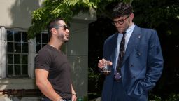 Abdul El-Sayed talks with streamer Hasan Piker at a party for content creators supporting his campaign, on August 3, in Detroit.
