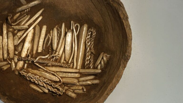 Hundreds of silver items were found in their original clay vessel.