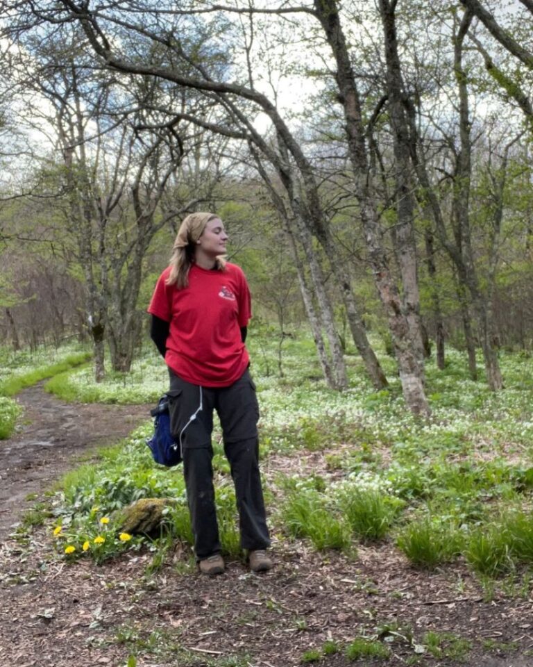 Olivia manages her TPN nutrition and various tubing when when hiking and camping in nature.