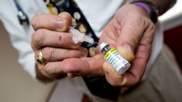 This 2015 photo shows a pediatrician preparing a shot of the HPV vaccine for a patient in Cranston, Rhode Island.