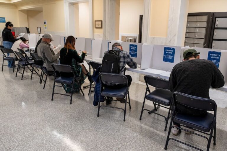 Voters cast their ballots at a polling location inside City Hall in San Francisco, during California's primary election on June 2.