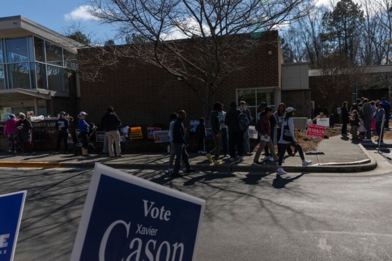 Voters arrive to cast their ballots at the Durham County North Regional Library on the last day of early voting in the North Carolina primary election in Durham, North Carolina, on February 28.