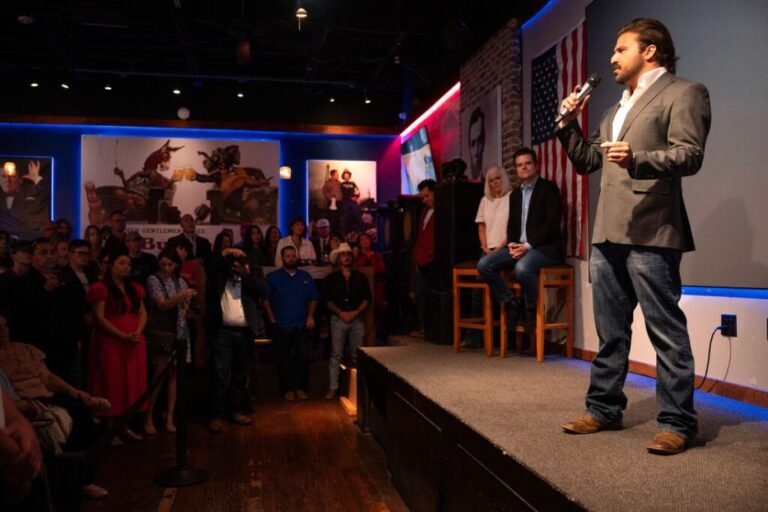 Brandon Herrera speaks at a campaign rally ahead of his runoff against Rep. Tony Gonzales, in March 2024.