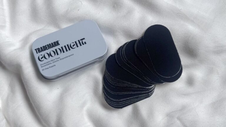 Trademark Goodnight mouth tape on a bed.