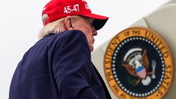 President Donald Trump boards Air Force One at Morristown Airport, Sunday, August 16, in Morristown, New Jersey.