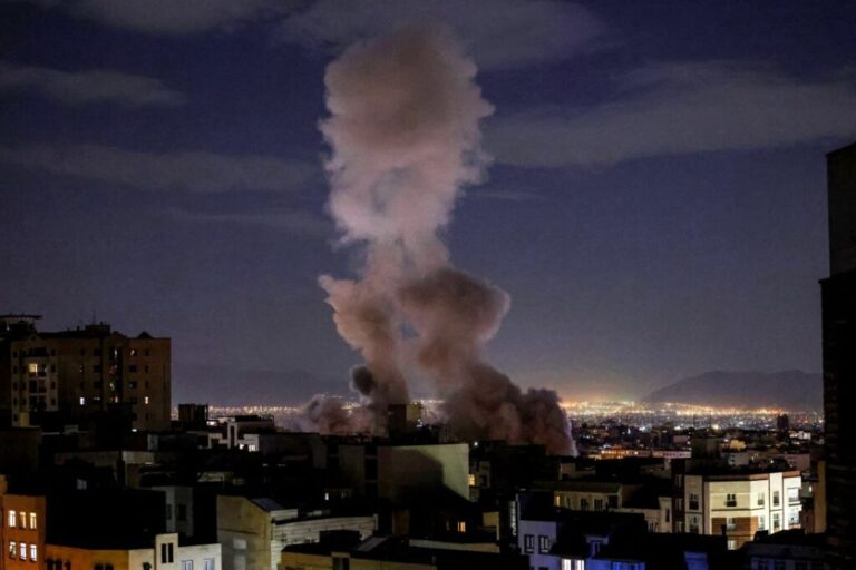 A smoke plume rises following a missile strike on a building in Tehran on March 1. The United States and Israel launched strikes against Iran on February 28, killing Iran's supreme leader and top military leaders, prompting authorities to retaliate with strikes on Israel and US bases across the Gulf.